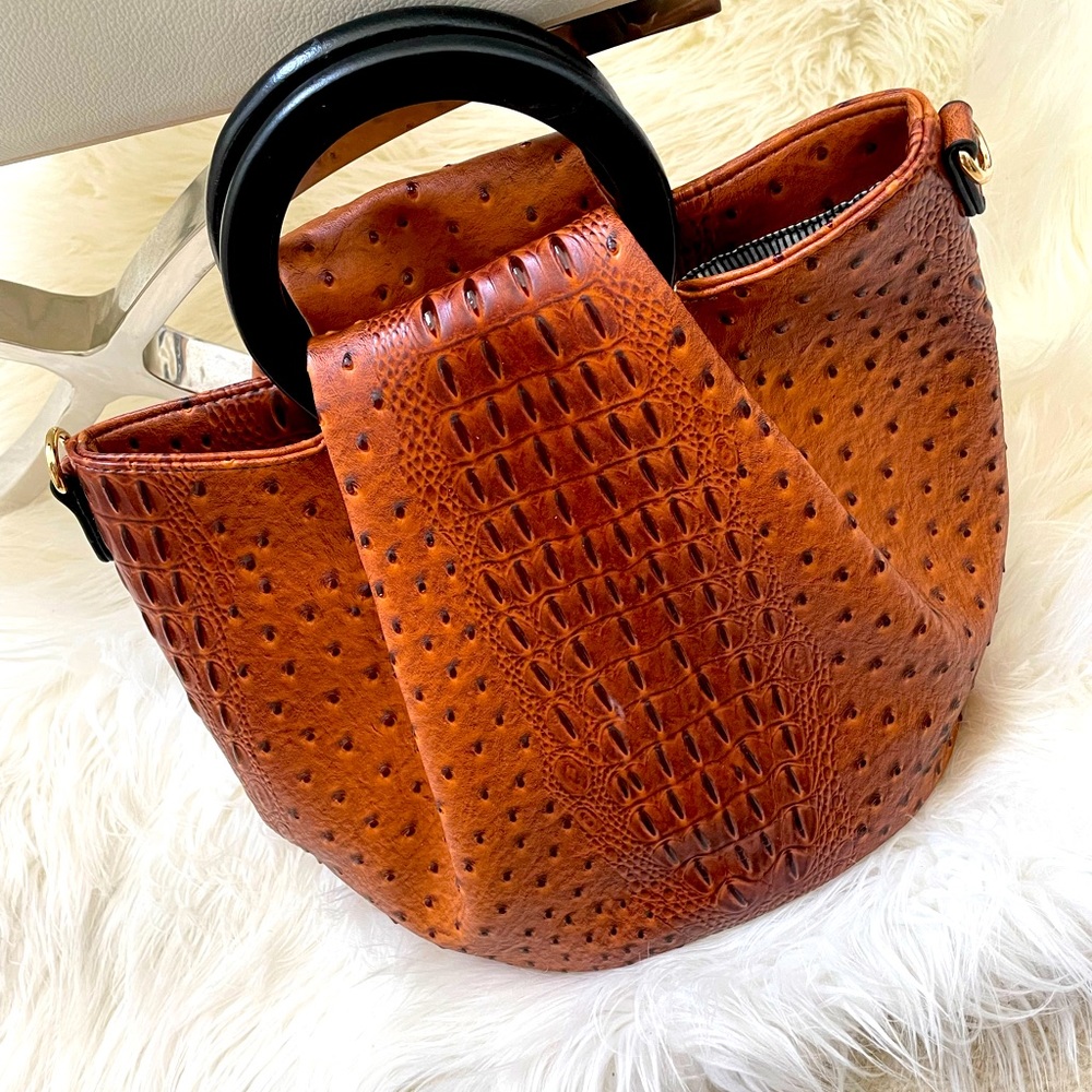 Never worn, smoke free home, and brand new tote bag